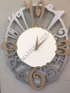 Callea design merletto wall clock oval-shaped in caffelatte colour