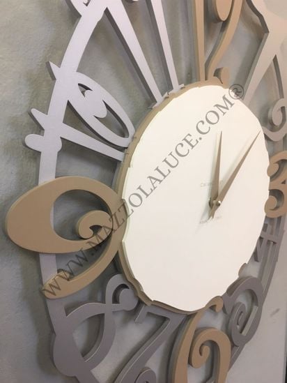 Picture of Callea design merletto wall clock oval-shaped in caffelatte colour