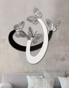 Picture of Orologio da parete moderno farfalle avorio nero laccato per soggiorno