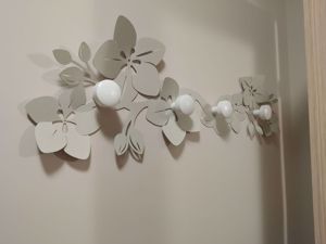 Picture of Appendiabiti da muro fiore di loto moderno metallo avorio