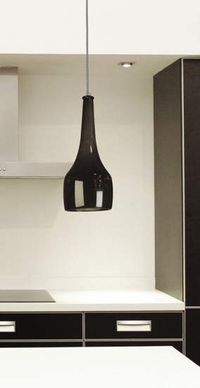 Black ceramic pendant light above isalnd/peninsula kitchen